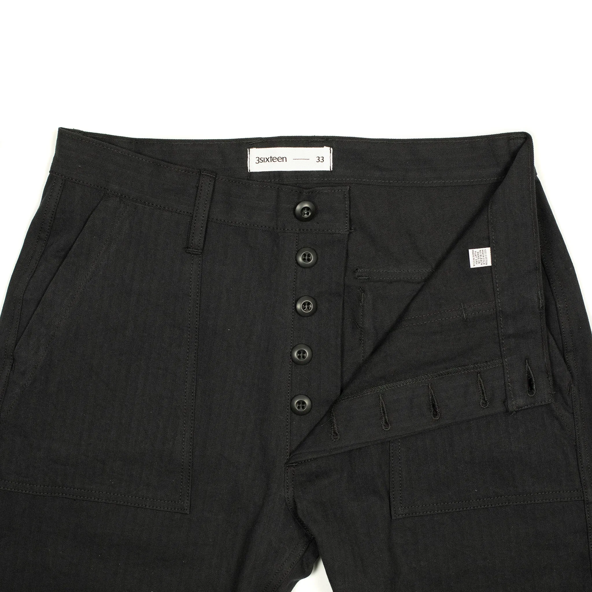 Fatigue pants in washed black herringbone cotton