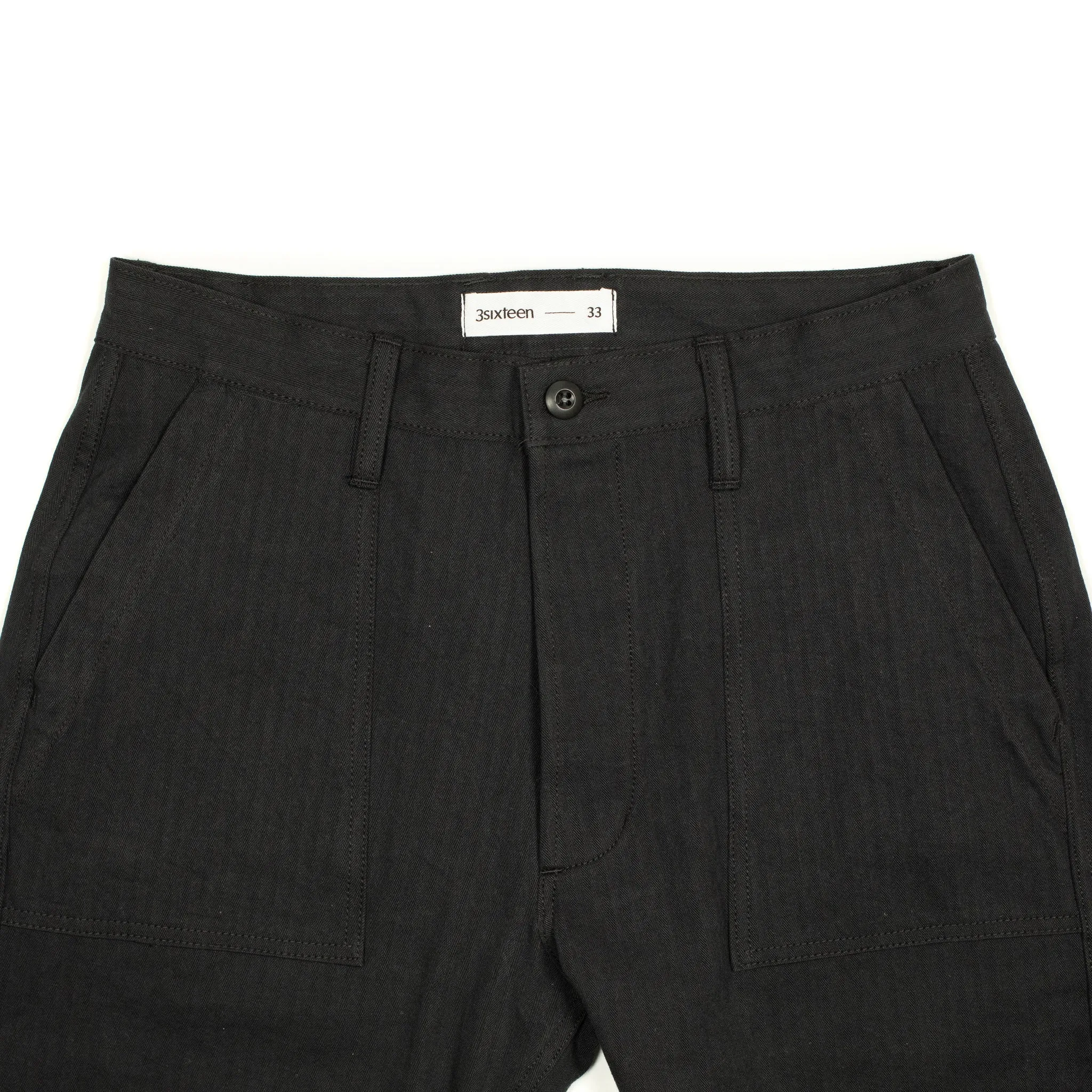 Fatigue pants in washed black herringbone cotton